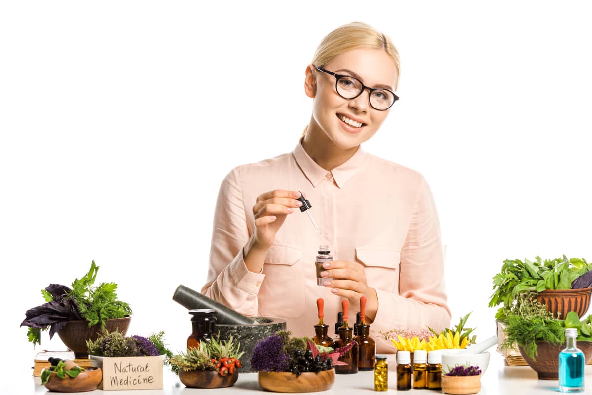 woman making essential oils small